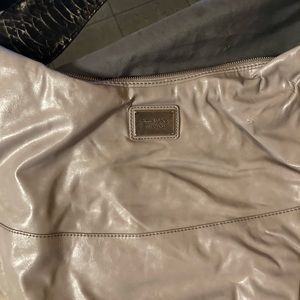 Woman’s purses from Michael kors to Vera wang